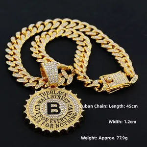 Detail of hip hop Cuban link chain with iced out B pendant, 45cm length and 1.2cm width