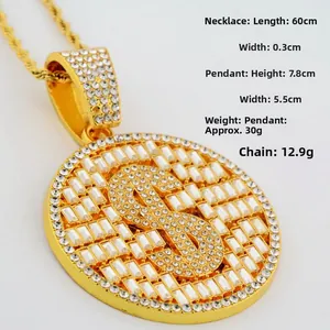 Detail view of hip-hop gold plated dollar sign pendant with cubic zirconia inlay