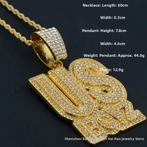 Macro shot of hip hop pendant necklace with iced out crystals and gold-plated chain details