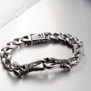Vintage silver titanium steel Cuban chain bracelet with intricate gothic pattern engravings