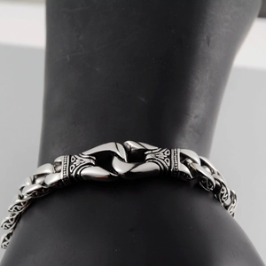 Vintage Cuban link bracelet for men in silver steel with bohemian engraved clasp detail