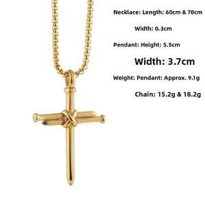 Close-up of golden nail cross pendant with detailed size measurements on box chain