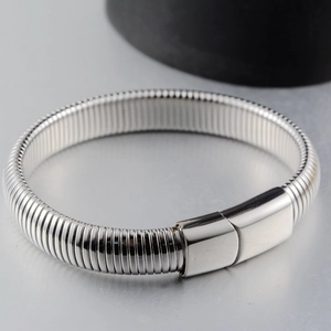 Silver stainless steel wire bracelet with a wide polished magnetic clasp for men