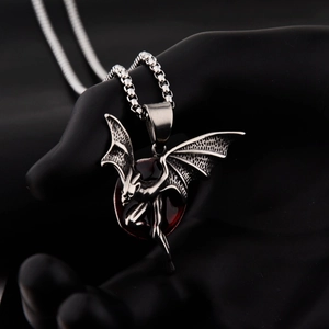Gothic hip-hop bat pendant necklace in vintage silver with a striking red gemstone