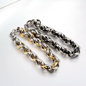 Industrielles Streetstyle Gliederkettenarmband aus Titanstahl in Gold und Silber Optik
