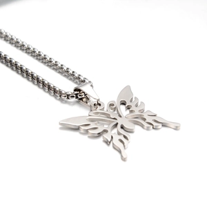 Titanium steel butterfly pendant necklace with hollow flame pattern on silver bead chain