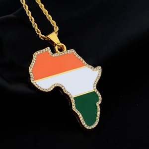 Detailed close-up of Ivory Coast map pendant with rhinestones and golden rope chain