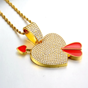 Hip-hop iced-out heart and arrow pendant with gold rope chain and red enamel detail