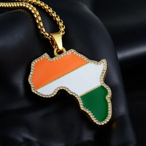 Detail of African map pendant with Cote d'Ivoire flag colors and rhinestones