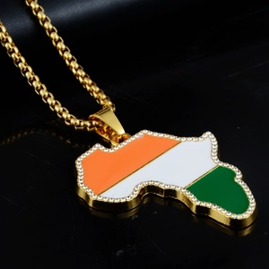 Close-up of Africa map pendant with Ivory Coast flag enamel and sparkling rhinestones