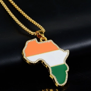 Detailed close-up of Ivory Coast flag map pendant with crystals on black leather