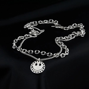 Double-layered silver star and smiley face pendant necklace in polished titanium steel