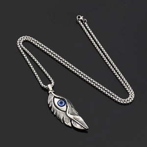 Hip hop titanium steel necklace featuring a vintage silver feather with a blue evil eye bead