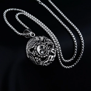 Unisex stainless steel Bagua Tai Chi dragon necklace with a vintage embossed round pendant