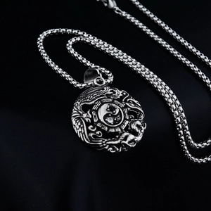 Vintage stainless steel Yin Yang dragon necklace with black white stones on black silk