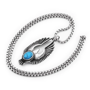 Vintage eagle sun pendant necklace with turquoise stone in stainless steel finish