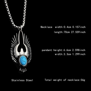Hip hop stainless steel eagle pendant necklace with green turquoise stone on black background