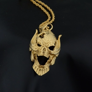 Pendentif masque tête de mort doré style hip hop avec chaîne torsadée pour hommes et femmes