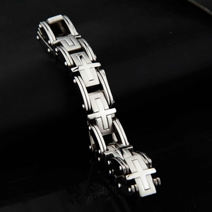 Mens punk titanium steel chain bracelet featuring embossed cross links on dark leather