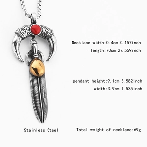 Macro view of stainless steel horn and feather pendant with dimensions on white background