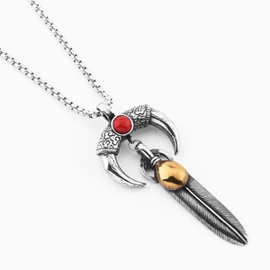 Vintage horn and feather pendant necklace with red gemstone on silver box chain