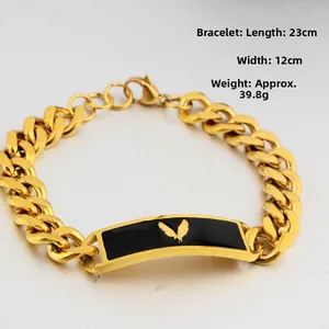 Detail of gold-plated eagle bracelet with dimensions showing 23cm length and 12mm width
