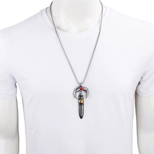 Ethnic tribal necklace with silver crescent, red bead, and feather pendant for men