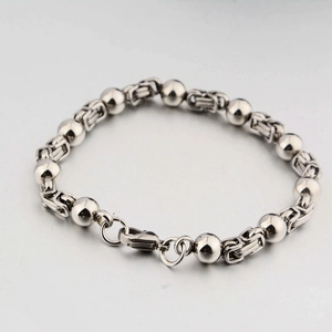 Bracciale da uomo in acciaio al titanio con catena bizantina e perline, chiusura a moschettone