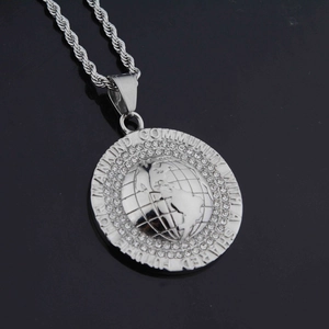 Detail of silver earth pendant with rhinestones and shared future mankind engraving