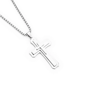 Detailed view of the triple-layered silver cross pendant on a sturdy box chain
