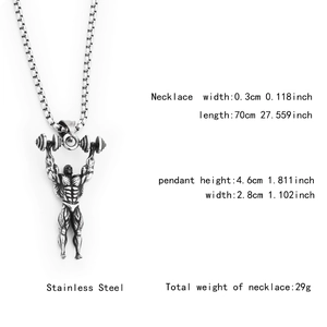 Detail view of a stainless steel muscular man pendant on a square box chain necklace