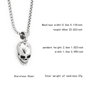Detailed view of polished stainless steel skull pendant with dimensions on box chain