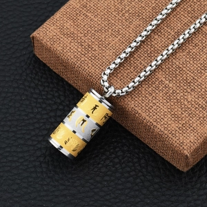 Collana con ciondolo a cilindro buddista rotante in acciaio inossidabile bicolore
