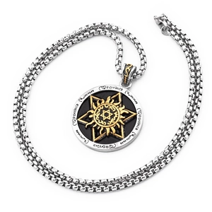 Macro view of retro star pendant with gold sun motif on stainless steel box chain necklace