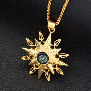 Golden sun compass pendant necklace with detailed nautical star engraving on black leather