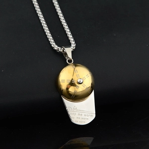 Detailed close-up of hip-hop baseball cap pendant with Keep me warm engraving and silver chain