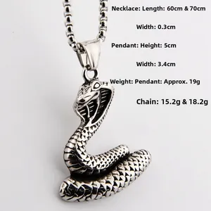 Detailed close-up of a vintage steel cobra snake pendant with precise scale texture and dimensions