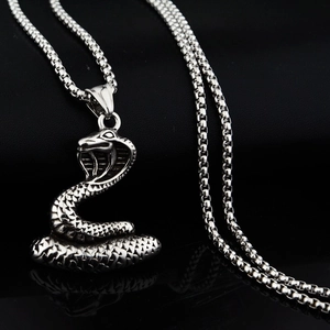 Punk style cobra pendant necklace in vintage silver finish with scale texture details