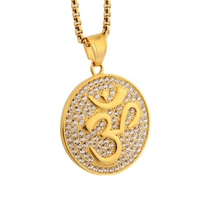 Gold-plated Om symbol pendant necklace with sparkling crystal inlay on box chain