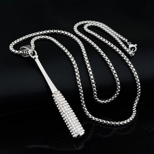 Close-up of hip hop baseball bat pendant with sparkling rhinestones on box chain