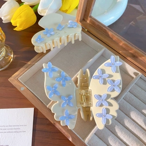 Set molletta per capelli a farfalla e fermaglio floreale con fiori blu e strass