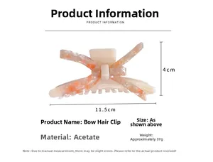 Vue détaillée de la pince à cheveux en acétate avec dimensions 11,5 cm de long et 4 cm de haut
