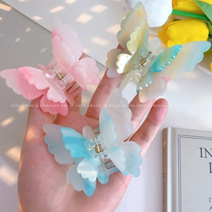 Colorful gradient butterfly hair clips for women in pink and blue acetate styles