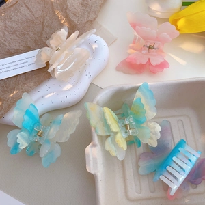 Set of five colorful double-layer butterfly hair clips with marble and gradient finishes