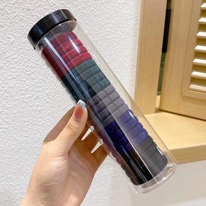 Multi-color high elastic hair ties set in a clear cylinder with portable black lid