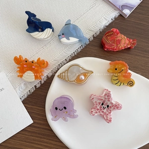 Set of 8 colorful ocean animal acetate hair claws including whale and starfish designs