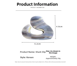 Detail view of a 6.2cm blue marble acetate hair claw clip showing size and dimensions