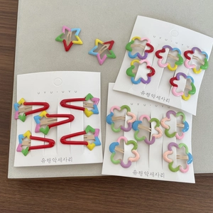 Rainbow metal flower and star hair clip set for girls on card display