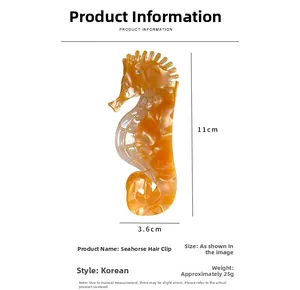 Détail de la pince à cheveux hippocampe en acétate ambré, taille 11cm x 3,6cm