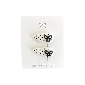 Set of 2 Japanese style hair clips with white black polka dots and 3D ribbon bow